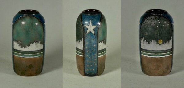 A composite photograph that shows three sides of a ceramic vase created by William Tersteeg. The front view shows a nocturne depiction of the beach with a calm ocean and cloudy sky. The side view shows a dark blue stripe meant to look like the night sky with one large white star at the top and several smaller white specks below it, giving the sense of a shooting star. The back view is another nocturne of the beach, this one with a darker sky and stars in the sky.