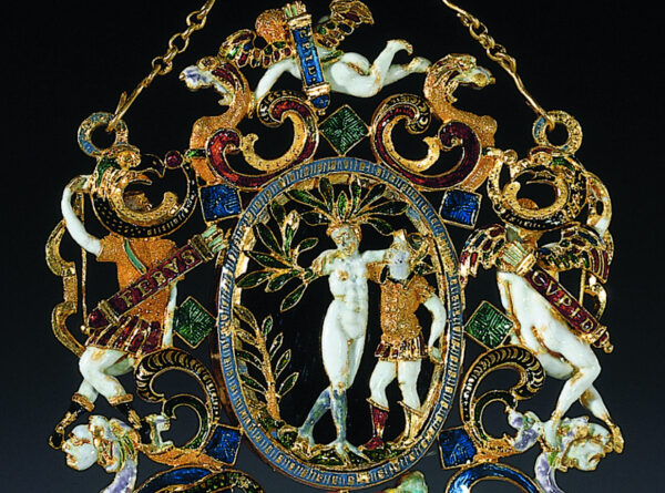 Detail of an ornate gold pendant that shows Daphne turning into a Laurel Tree in the center