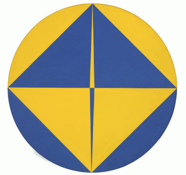 A large circular canvas painted by artist Carmen Herrera. The abstract work includes a large diamond shape with each corner touching the edge of the circular canvas. Inside the large diamond is a tall thin diamond with just the top and bottom points touching the edge of the circular canvas. The canvas is painted yellow and blue with the colors alternating throughout. 
