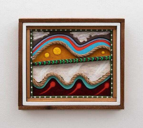 a mixed media work by Daniel Rios Rodriguez that shows a landscape with multi-colored rope and surreal colors