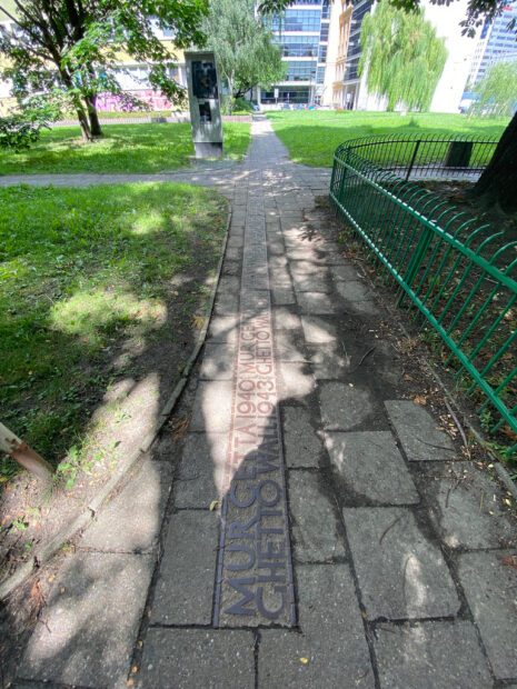 Photo of the ground in downtown Warsaw that delineates the Warsaw Ghetto Wall