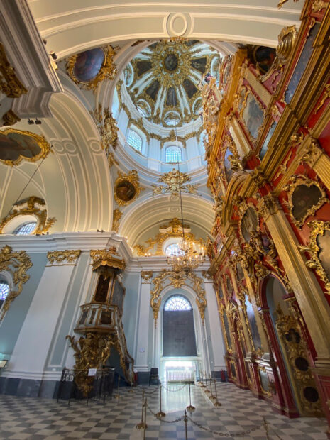 Photo of Saint Andrews Church in Kiev showing the ornate Baroque gold leafed and red altar and soaring arches