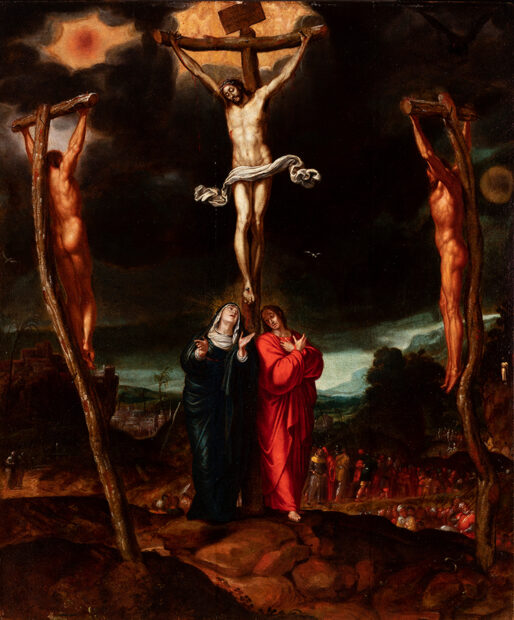 A 16th century painting by Pedro de Campaña of the crucifixion of Christ. Christ appears at the top center of the painting on a cross and is flanked by two unknown men who are also being crucified. At Christ's feet, stand Mary and John both with halos. There is a large crowd of people in the distant background. 