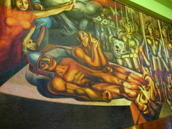 Detail of a mural in Mexico City depicting the emperor Cuauhtemoc with his feet in a fire being tortured by the Spanish