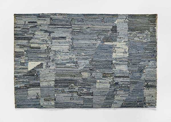 A large rectangular fabric work by Jamal Cyrus. The work is made from various shades of blue denim. Throughout the work there are X's scattered and each X has an associated number.