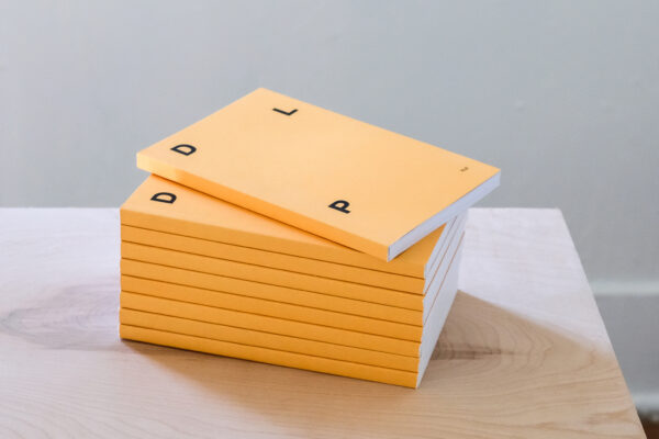 Photo of a stack of yellow books
