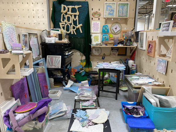 A photograph of Laura Davidson's studio with several in-progress projects throughout.