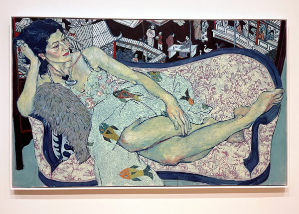A large-scale portrait of a woman reclining on a couch. The figure is rendered in shades of cream and blue.