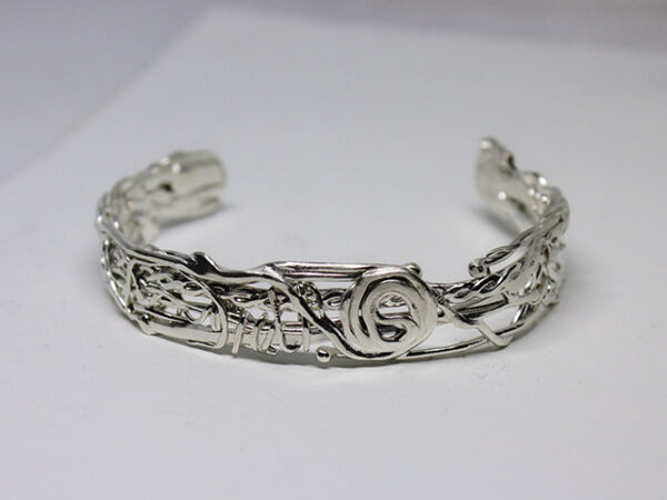 A silver bracelet made by Jefferson Woodruff.