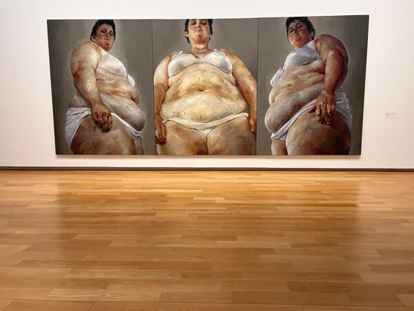 A triptych of paintings of the same full-bodied female figure from slightly different perspectives.