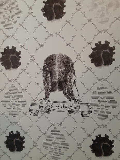 Installation image of wallpaper with a motif of the back of people's heads of hair