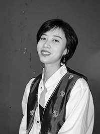 A black and white headshot of Chenlu Hou.