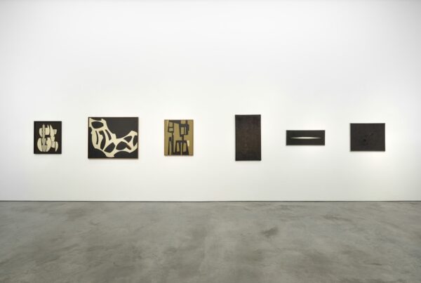 An installation view of six abstract works by Elsa Gramcko hanging on a white gallery wall.