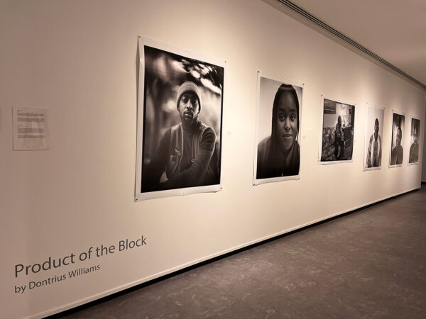 An installation image of a photographic exhibition of works by Dontrius Williams. 
