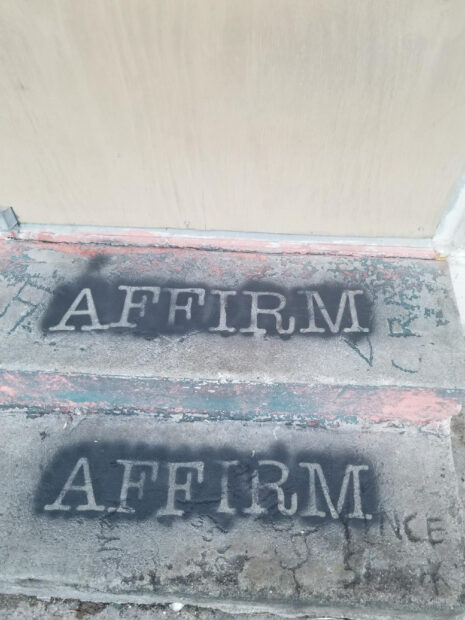 Photo of the word "Affirm" in public space
