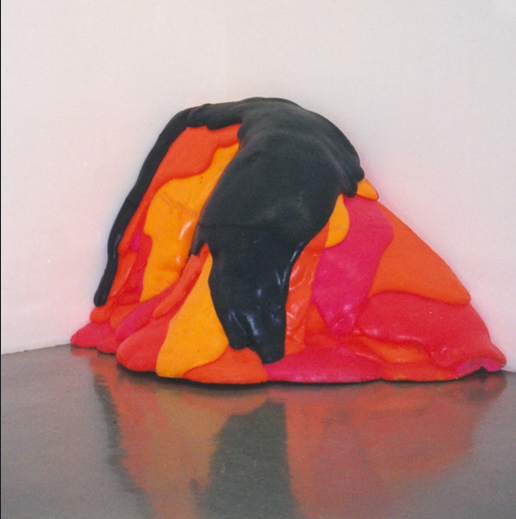 Installation photo of a blob of paint in a corner