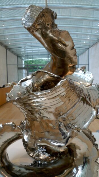 Large scale stainless steel sculpture on a pedestal