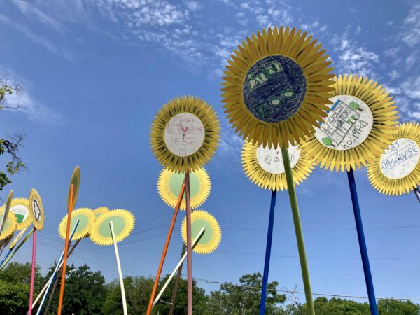 Detail of a public sculpture of oversized steel sunflowers