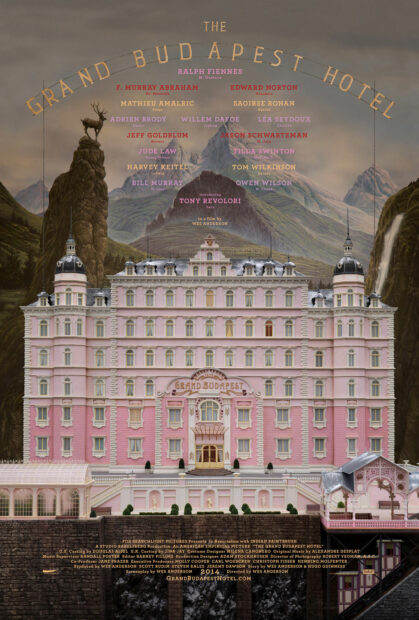 A poster for Wes Anderson's failm The Grand Budapest Hotel. The poster features the name of the film, and actor credit lines, and features the image of the hotel, which is a large pink building sitting in front of a mountainous backdrop.