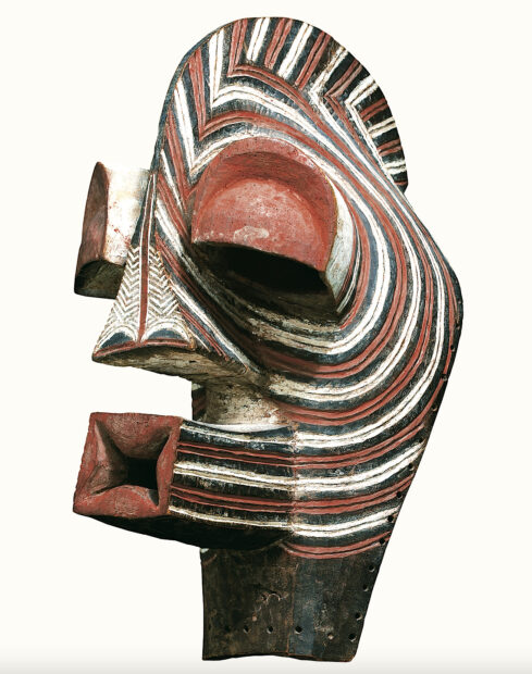 African mask with white, black, and red detailing