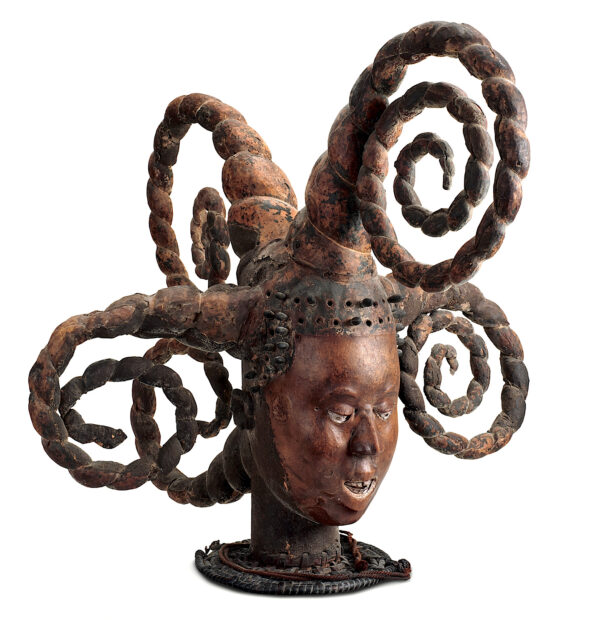 Mask with twisted embellishments swirling from the head