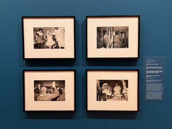 An installation of four black and white photographs depicting community gatherings. The image is part of the "Black Every Day" exhibition at the Amon Carter Museum of American Art.