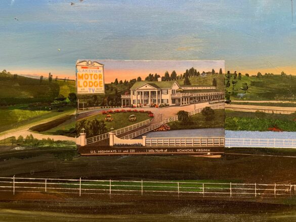 A postcard picturing a motor lodge sits on top of a panel that has been painted to match the postcard's photograph.