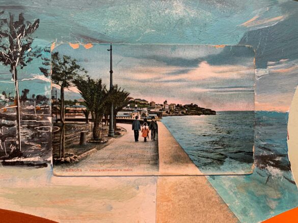 A postcard picturing a walkway next to a large body of water sits on top of a panel that has been painted to match the postcard's photograph.
