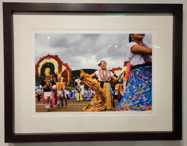 Colorful photo of people dancing in a festival in Oaxaca