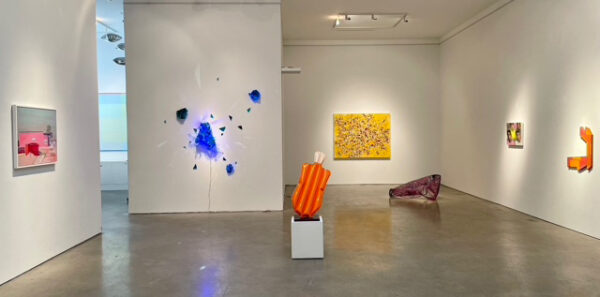 Installation view of works on the wall, and sculptures in a white cube gallery