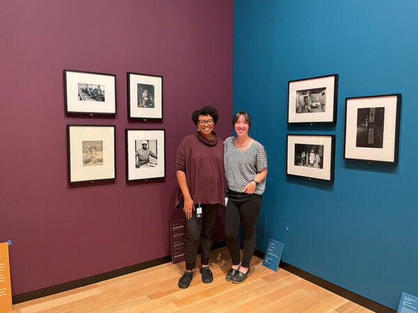 Lauren Cross and Kristen Gaylord pose for a photograph together inside the exhibition "Black Every Day."