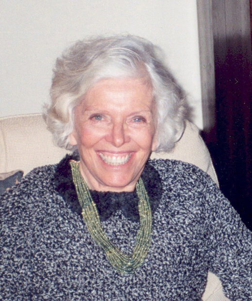 A photograph of Nancy Brown Negley. She looks straight into the camera with a wide smile.