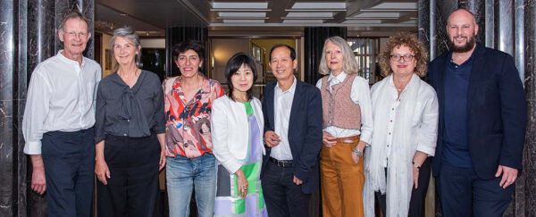 A photograph of the eight member team of the 2023 Nasher Prize Jury.