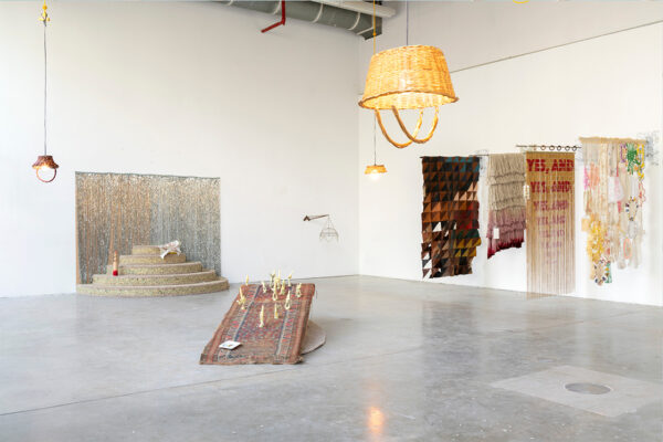 A photograph of several sculptural works by Gabrielle Constantine installed in a white walled gallery.
