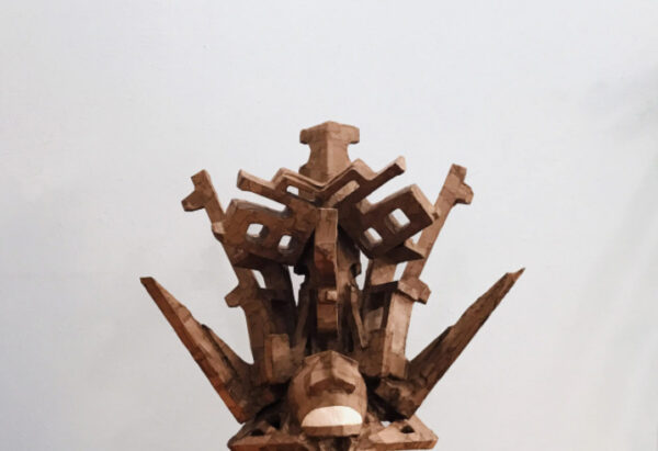 A photograph of a geometric sculpture by Luis Valderas.