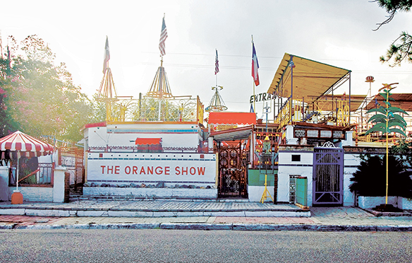 A photograph of The Orange Show, a 3,000-square-foot maze-like folk art environment. 