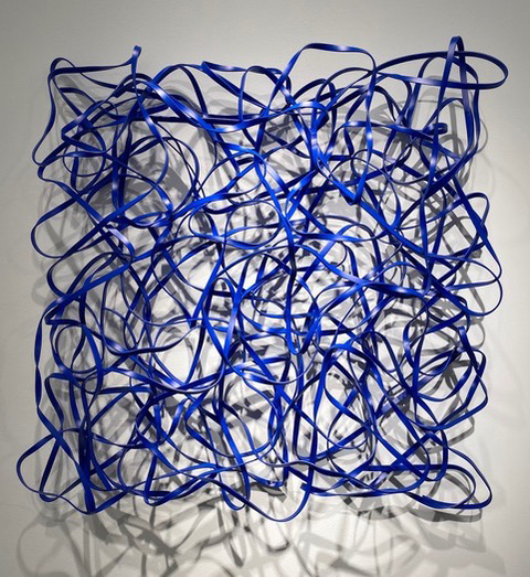 Steel with blue powder coating sculpture of squiggly lines