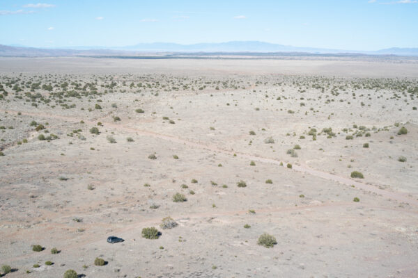 Image of an expansive, desolate desert landscape