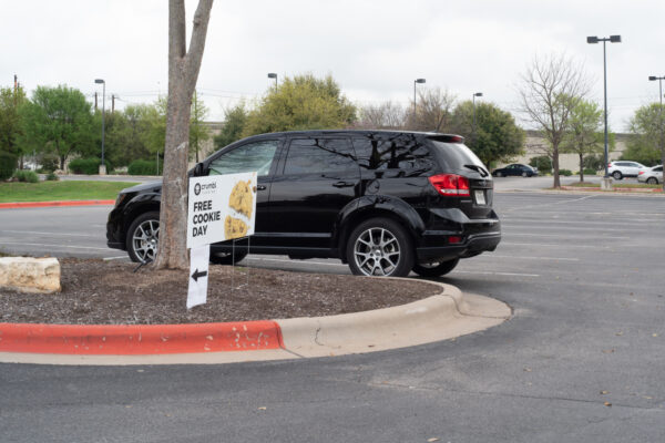 Photo of a black car in a parking lot