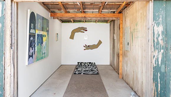 Installation view of works in a project space shed