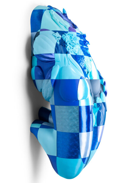 Voluminous sculpture in various shares of blue squares