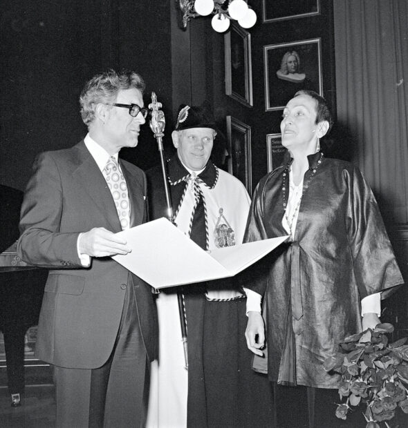 Oppenheim receiving an award