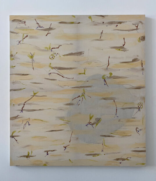 A white rectangular muslin painting is stained with linework in rust, yellow and greens.
