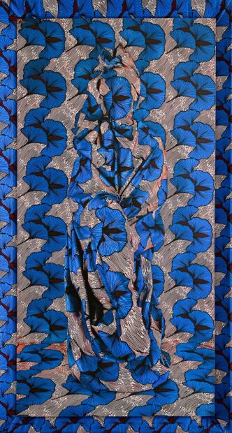 Blue and silver patterned fabric with a human figure