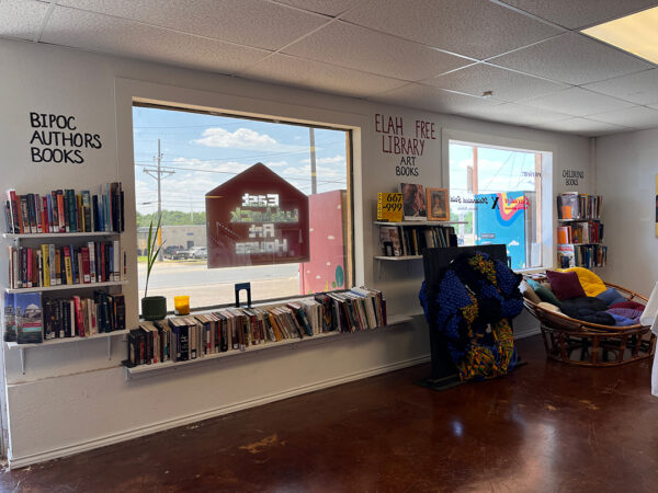 A photograph of the East Lubbock Art House free library, which has three sections: BIPOC Authors, Art Books, and Children's Books.