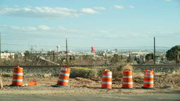 Photo of construction tubs and the border X in El Paso/Juarez