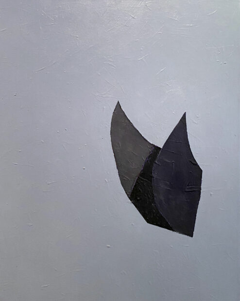 Acrylic painting of a black shape against a white backdrop