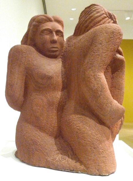 Sculpture of two people struggling
