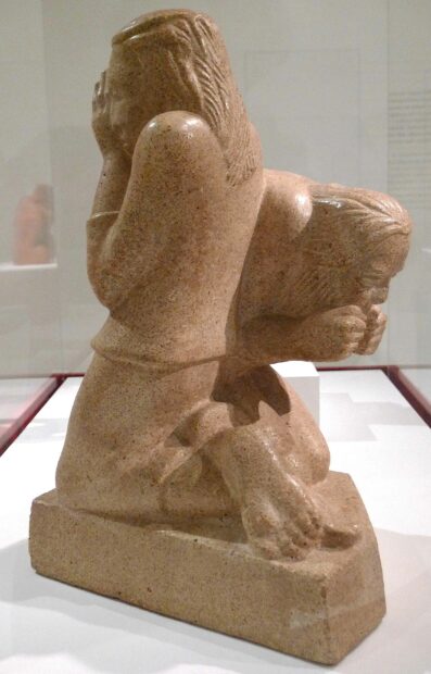 Sculpture of two kneeling people