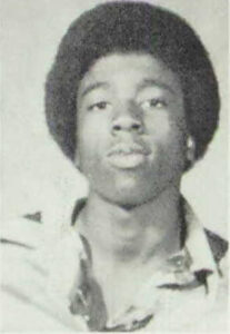 A black and white high school year book photograph of Alfred Walker.